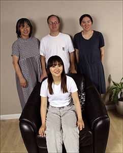 professional portrait photo of Kotone and neighbors at farewell open house for Kotone