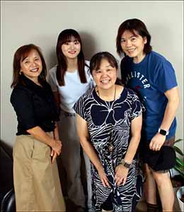 professional portrait photo of Kotone and neighbors at farewell open house for Kotone