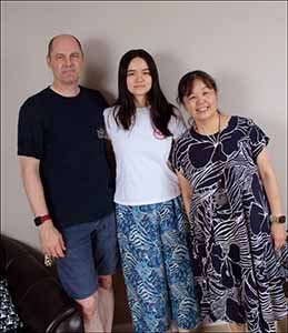 professional portrait photo of Kotone and neighbors at farewell open house for Kotone