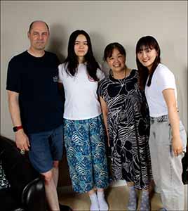 professional portrait photo of Kotone and neighbors at farewell open house for Kotone