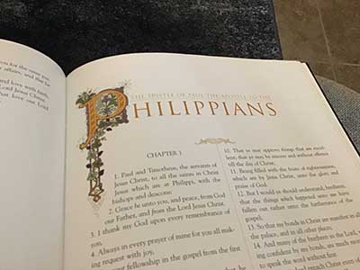 Bible opened to the book of Philippians