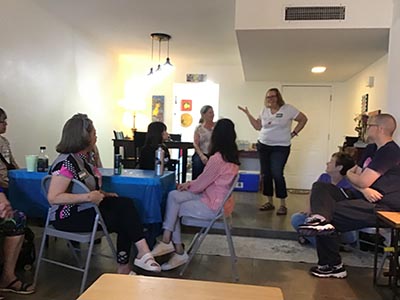 guests at Meow-Mixer cat-lovers potluck lunch event