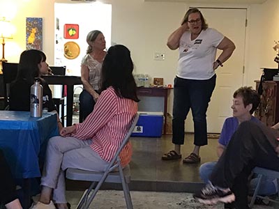 guests at Meow-Mixer cat-lovers potluck lunch event