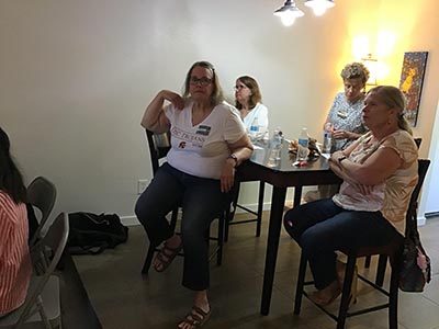 guests at Meow-Mixer cat-lovers potluck lunch event