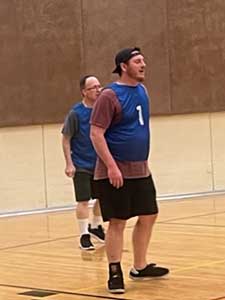 neighbors playing indoor soccer