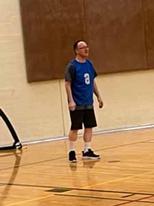 neighbors playing indoor soccer