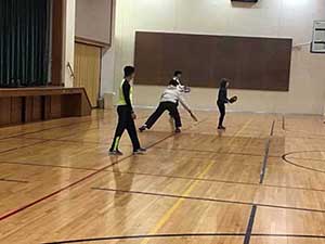 neighbors playing pickleball