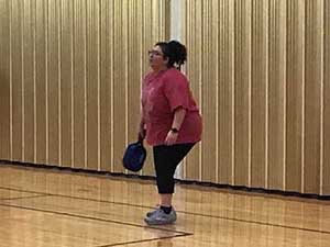 neighbors playing pickleball