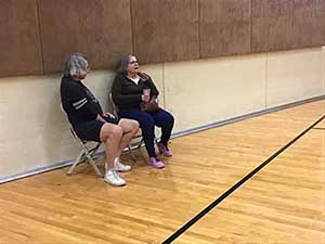 neighbors playing pickleball