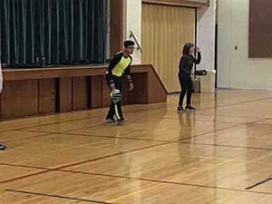 neighbors playing pickleball