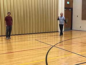 neighbors playing pickleball