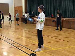 neighbors playing pickleball