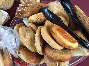 neighbors gather at for Thanksgiving Day potluck dinner