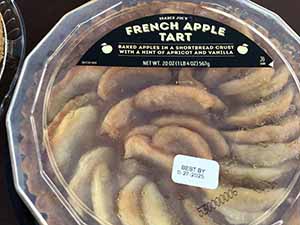 neighbors gather at for Thanksgiving Day potluck dinner