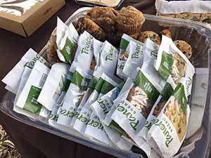 neighbors gather at for Thanksgiving Day potluck dinner