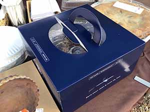 neighbors gather at for Thanksgiving Day potluck dinner