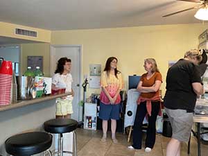 Tempe area neighbors gather at a watch party to watch the movie Hamnet