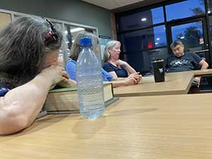 Tempe area neighbors at book club meeting in Tempe Public Library discussing the novel Hamnet