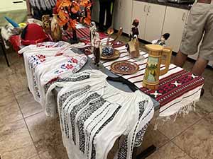 Tempe area neighbors at potluck dinner celebrating Romania