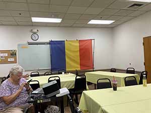Tempe area neighbors at potluck dinner celebrating Romania