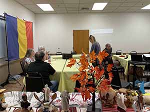 Tempe area neighbors at potluck dinner celebrating Romania