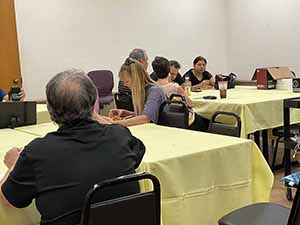 Tempe area neighbors at potluck dinner celebrating Romania