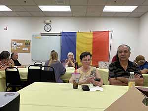 Tempe area neighbors at potluck dinner celebrating Romania