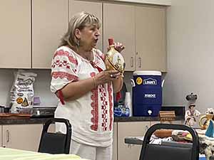 Tempe area neighbors at potluck dinner celebrating Romania