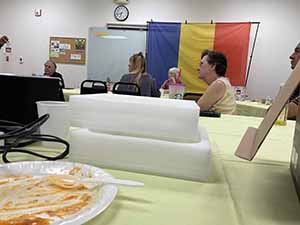 Tempe area neighbors at potluck dinner celebrating Romania