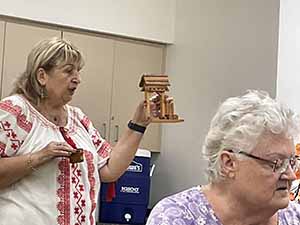 Tempe area neighbors at potluck dinner celebrating Romania