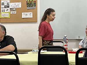 Tempe area neighbors at potluck dinner celebrating Romania