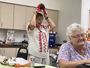 Tempe area neighbors at potluck dinner celebrating Romania
