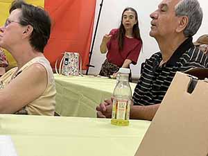 Tempe area neighbors at potluck dinner celebrating Romania